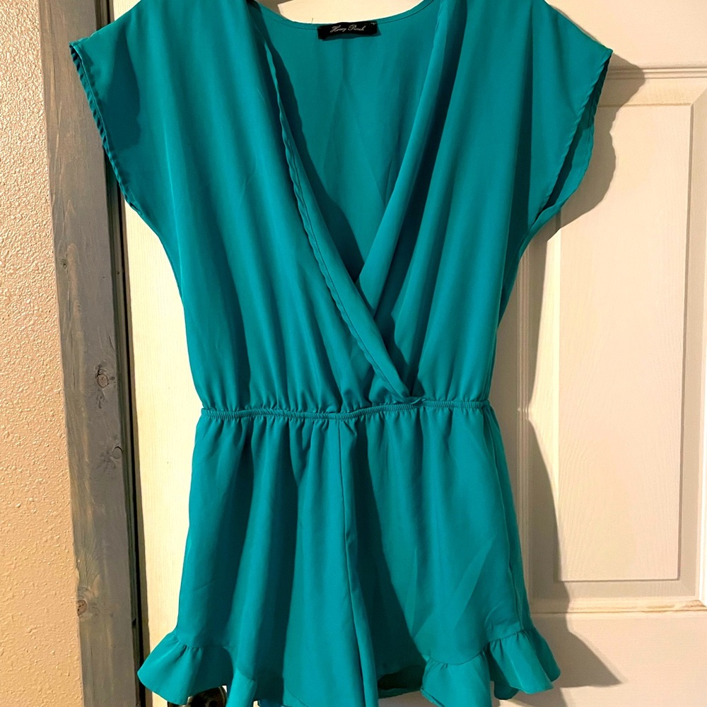Honey Punch Turquoise Romper with scalloped edge bottoms.Size Small.